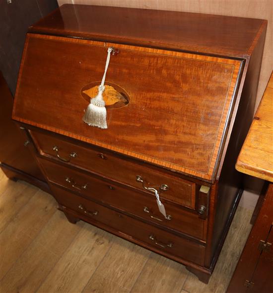 An Edwardian inlaid mahogany bureau